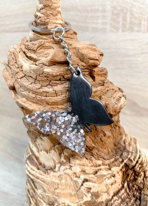 Porte-clés papillon noir et paillettes argent