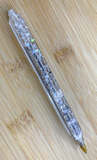 Stylo "rechargeable" carré transparent avec paillettes argentées