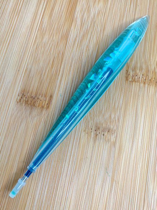 Stylo "rechargeable" ovale bleu et paillettes holographiques
