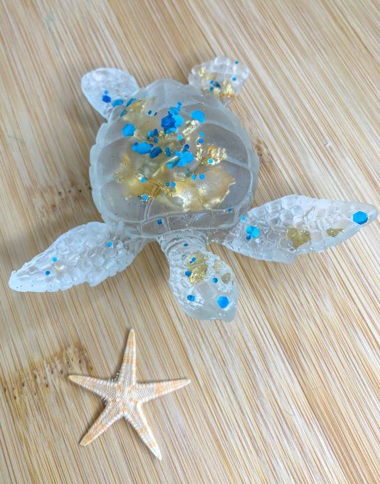 Tortue transparente feuilles or et paillettes bleues