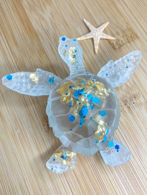 Tortue transparente feuilles or et paillettes bleues