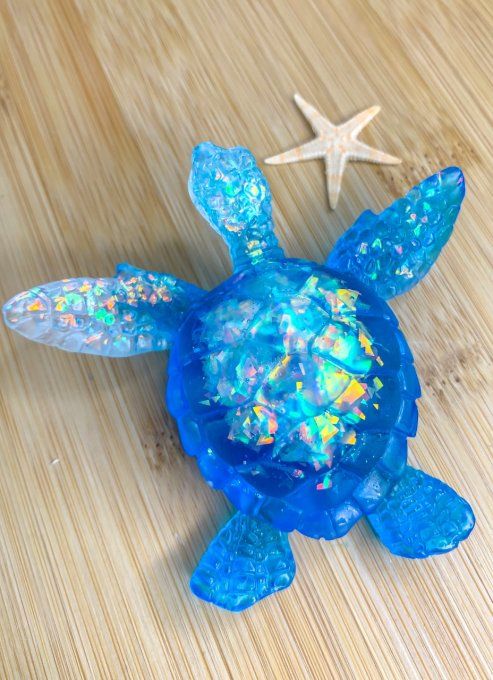 Tortue bleue, transparente et holographique