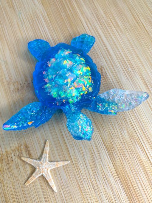 Tortue bleue, transparente et holographique